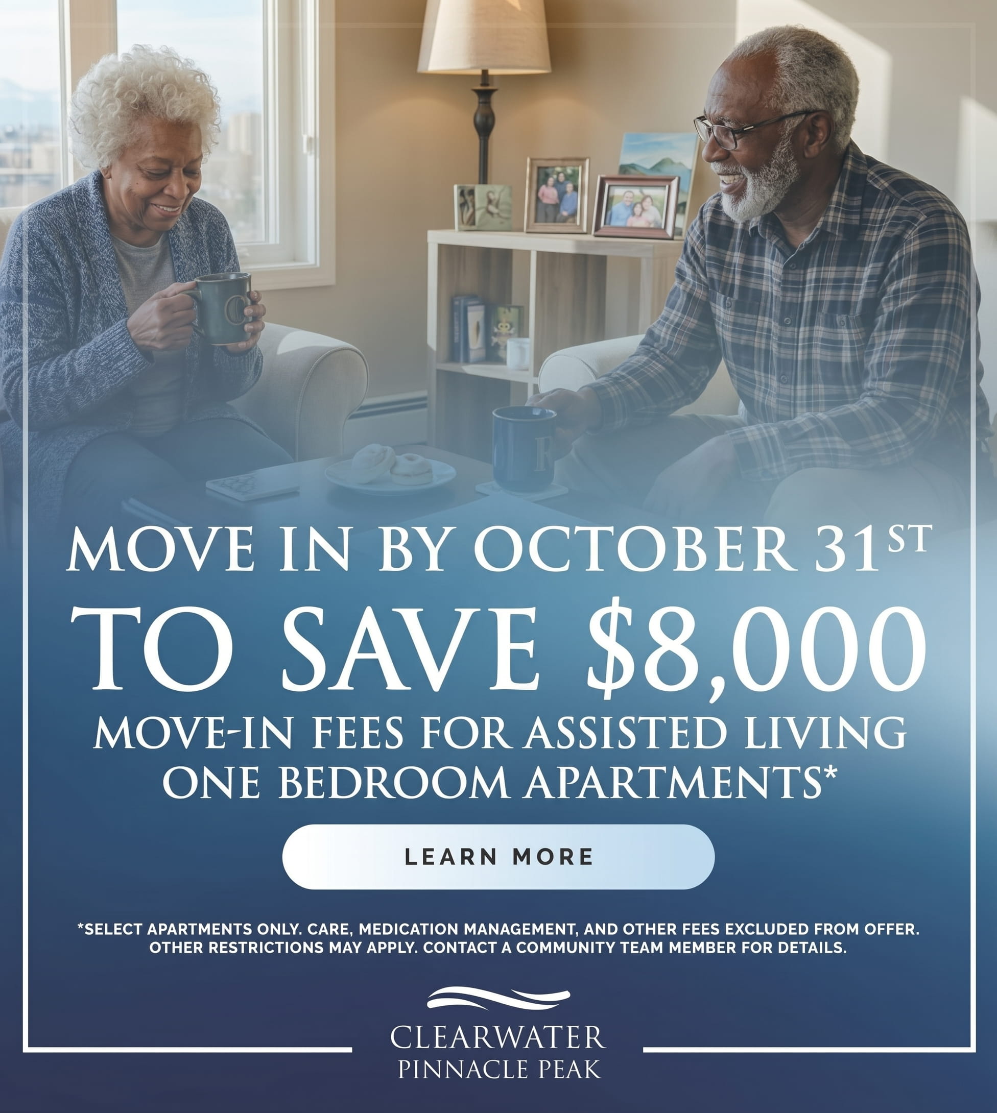 Smiling elderly couple in a living room with mugs; overlay ad text promotes moving in by Oct 31 to save $8,000 on assisted living at Clearwater Pinnacle Peak.